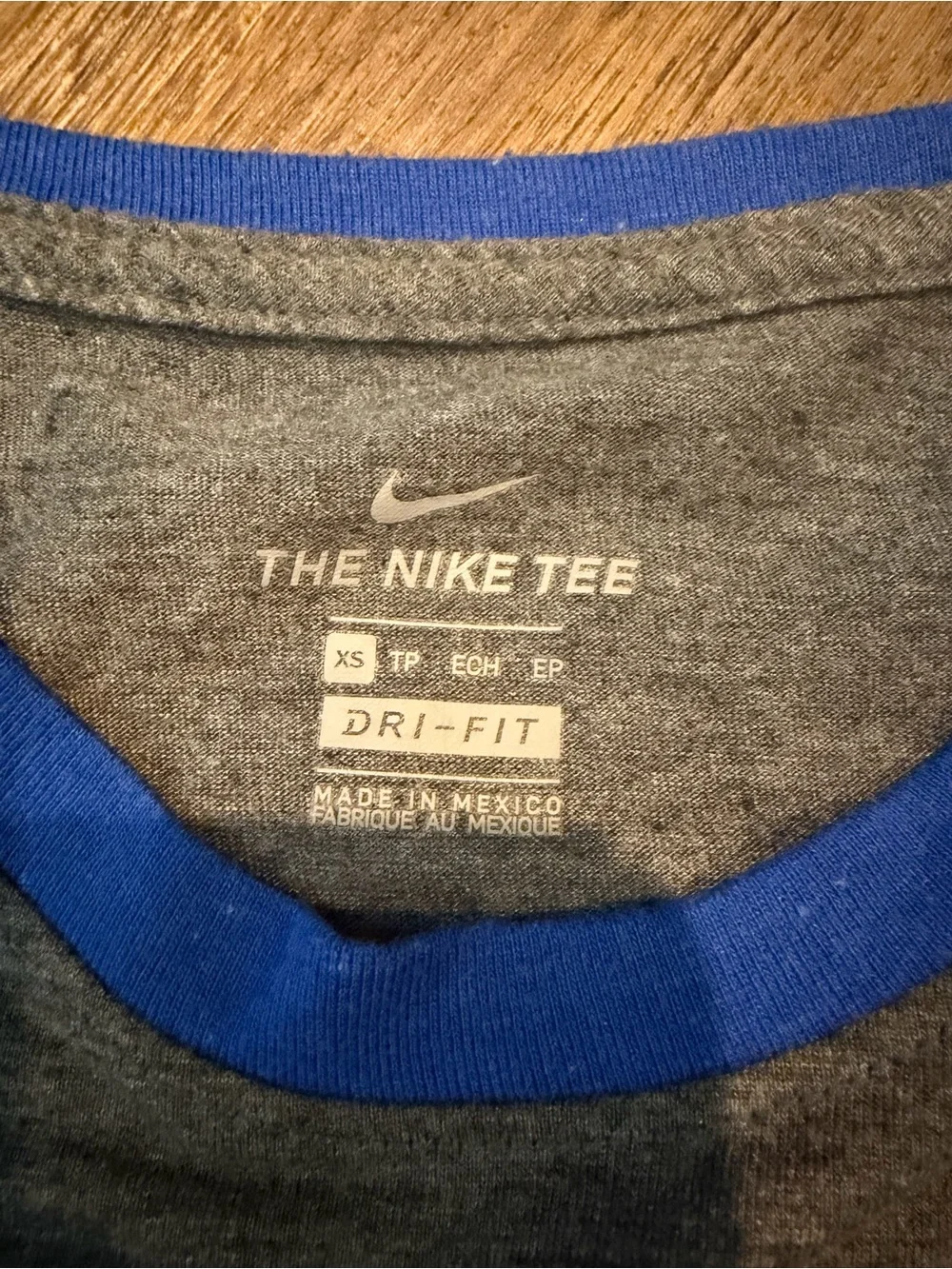 Nike Women’s Gray Tee with Royal Blue Raglan Sleeves and UK Logo